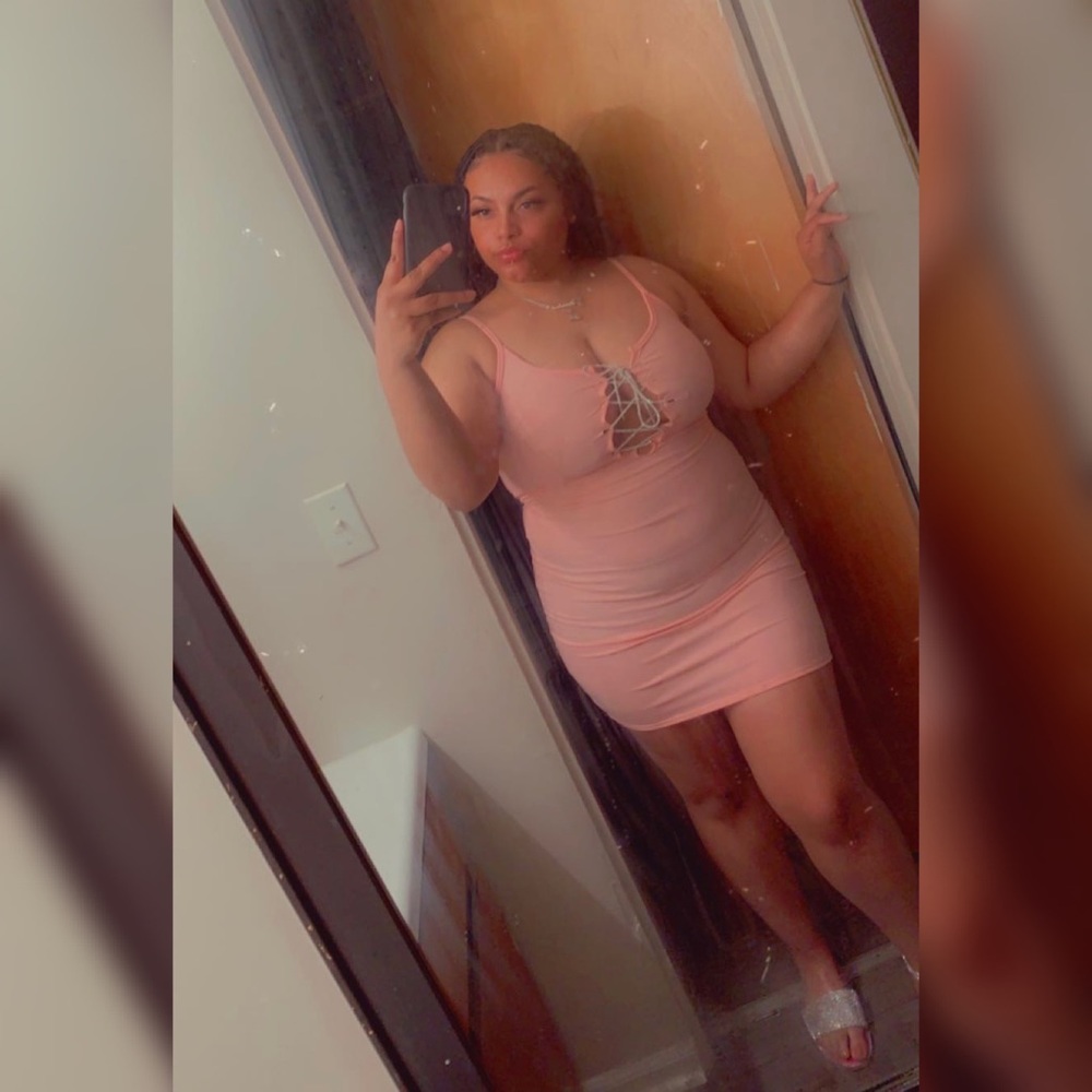 Pink spaghetti strap dress.